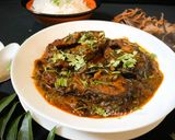 A picture of step 6 of Gongura Chepala Pulusu (Andhra style Fish Curry with Sorrel Leaves).