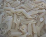 Gambar langkah 1 resipi Cheesy Penne Pasta with Sausage.