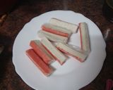 Foto del paso 5 de la receta: Ensalada mixta de col y cogollo con langostinos, palitos de cangrejo, piña y salsa rosa