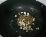 A picture of step 4 of Tomatoes, burnt garlic dip.