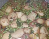 A picture of step 5 of Aloo and Matar pulao.