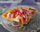 A picture of step 12 of Capsicum Onion Cheese Pizza.