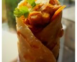 A picture of step 5 of Kolkata style Chicken Kathi Roll.