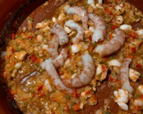 Foto del paso 3 de la receta: Arroz meloso con gambones, calamares y almejas