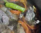 A picture of step 3 of Pork Ribs & Water Spinach in Tamarind Broth - Filipino Sinigang.