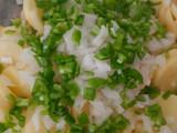 Papas con queso y huevo al horno