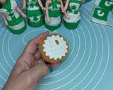A picture of step 4 of Ready-made cupcakes with Fondant topper independence day theme.