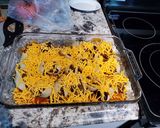 A picture of step 6 of Stuffed Enchilada Shells.