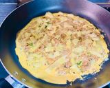 A picture of step 3 of Omelette with canned tuna on toast.