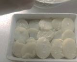 A picture of step 11 of Cottage Pie using dauphinoise potatoes.