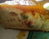 A picture of step 17 of Vanilla tutti fruity cake with Mango topping.