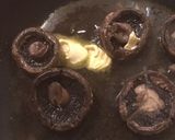 A picture of step 5 of Juicy portabellini mushrooms on seedy toast.