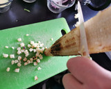 Foto del paso 5 de la receta: Chilaquiles con elote asado, frijoles negros y pepitas