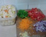 A picture of step 4 of Matoke/bananas with potatoes and avocado.