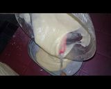 A picture of step 7 of Australian cake.. chocalate toping on vanilla cake.