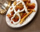 A picture of step 5 of Masala fries.