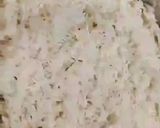 A picture of step 10 of Nizami chicken biryani.