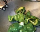 A picture of step 1 of Green shimla mirch gravy.