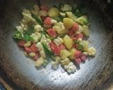 A picture of step 5 of Vegetable Coconut Curry.