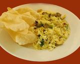 A picture of step 5 of Coconut Pulao (coconut pilaf).