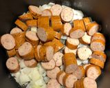 A picture of step 1 of Spinach Tortellini Soup with Smoked Sausage.