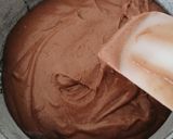 A picture of step 5 of Chocolate cake with chef's hat.