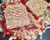 Une image de l'étape 3 de Nouilles sautés aux crevettes.