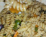 A picture of step 6 of Macaroni Jollof.