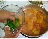 A picture of step 10 of Basa fish fillet curry with parsley.