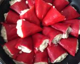 Foto del paso 7 de la receta Pimientos del piquillo rellenos de bacalao y pasas