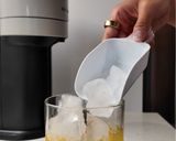 A picture of step 3 of Mango Calamansi Mojito Mocktail.