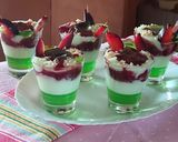 A picture of step 4 of Pista custard with banana jelly & plum jam.