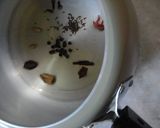 A picture of step 1 of Khada Masala Gosht with chapati.
