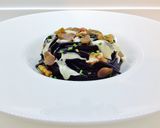 A picture of step 4 of Squid Ink Spaghetti with Shallot Cream and Bottarga.