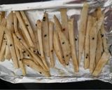 A picture of step 1 of Asian style celeriac matchstick chips.
