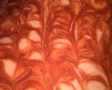 A picture of step 10 of Pumpkin Swirl Cheesecake Bars.