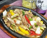 A picture of step 7 of Teppanyaki-Style Stir-Fried Beef with Scallions.