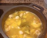 Foto del paso 4 de la receta: Estofado de patatas con calamares