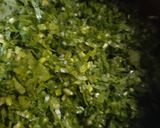 A picture of step 2 of Sarson Ka Saag and Makki Ki Roti.