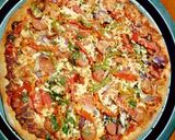 A picture of step 4 of Sausage pizza.