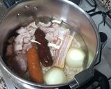 A picture of step 3 of Fabada with Chorizo, Blood Sausage, and Pork Ear in a Pressure Cooker.