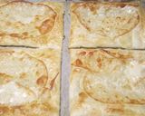 A picture of step 2 of Speck and scamorza triangle puffs.