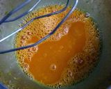 A picture of step 2 of 4 in 1 orange mousse sponge cake.