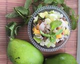 A picture of step 2 of Khatta meetha aam salad.