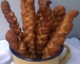 A picture of step 13 of Plaited Mandazi.