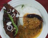A picture of step 2 of Fried fish khati daal and plain rice.