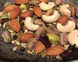 A picture of step 2 of Thandai with rose petals.