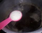 A picture of step 1 of Karak chai.