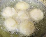 A picture of step 2 of Baby doughnuts with coconut & chocolate topping.