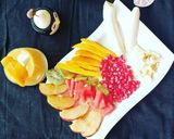 A picture of step 3 of Fresh Fruits and Mango juice.